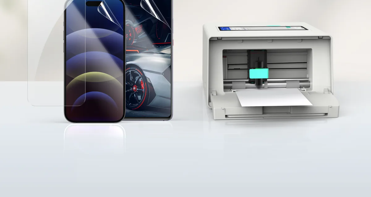 A screen protector being applied to a phone, with the machine beside it